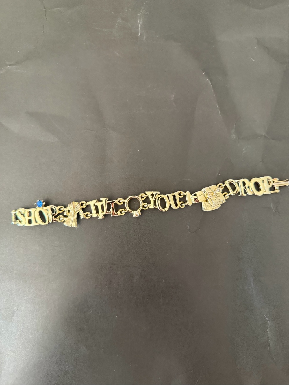 Gold Tone 'Shop Til You Drop' Charm Bracelet - Picture 2 of 5